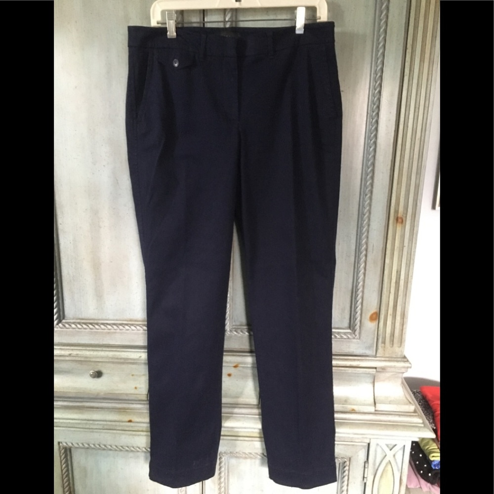 Navy blue (80% cotton/17% rayon/3% spandex) pants.